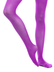 Woman slim legs and violet stockings isolated