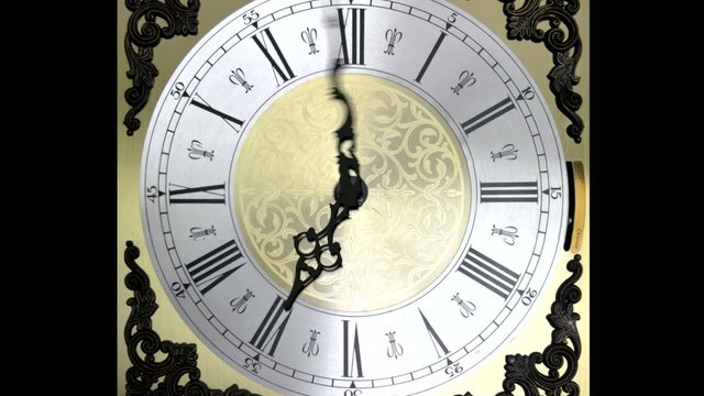 Clock face zoom running backward at speed ornate grandfather tim