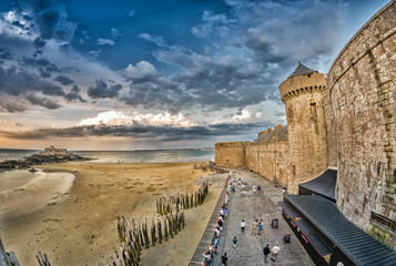Saint Malo beach and city medieval architecture during Low Tide.