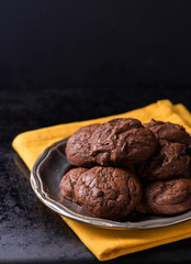Homemade chocolate cookies on metal plate