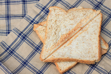 bread on tablecloth breakfast