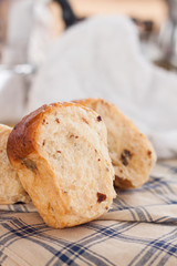 short focus of bread on tablecloth