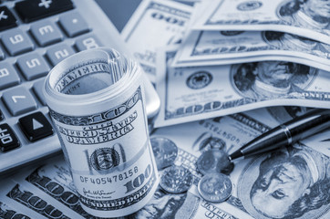 Fototapeta premium Closeup of calculator and US dollars