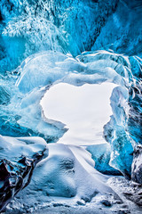 Blue ice cave view bakground in Iceland - obrazy, fototapety, plakaty