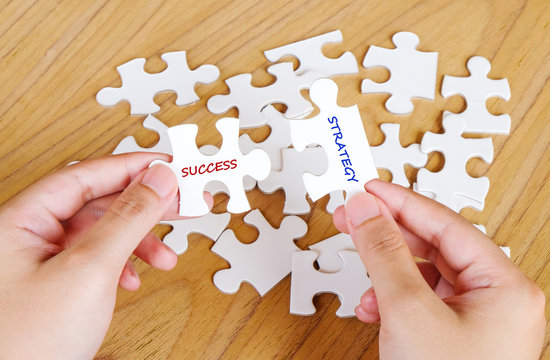 Success and strategy words on jigsaw pazzles,business background