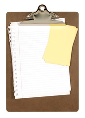 Clipboard or clip board with notepaper and yellow post it note isolated on white background photo