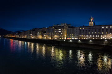 Fototapeta na wymiar Salzach river at night shot from old bridge