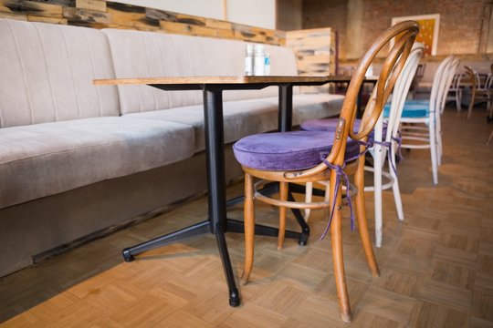 Stylish coffee shop with tables and chairs