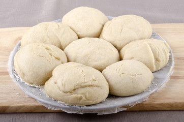 Fototapeta na wymiar freshly baked rolls on baking tray