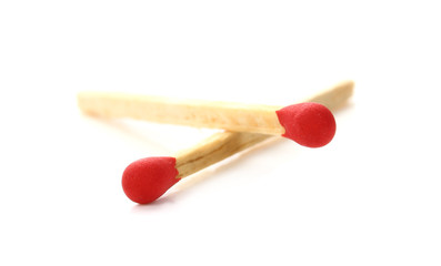 Close-up of a red match isolated on white