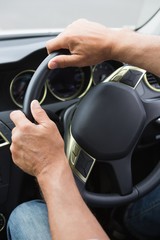 Naklejka premium Close up of man holding his wheel