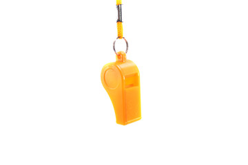 yellow whistle isolated on a white background