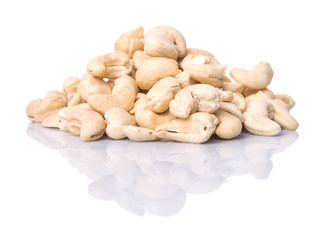 Raw cashew nuts over white background