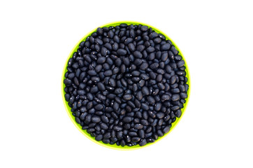 Black beans in bowl isolated on white