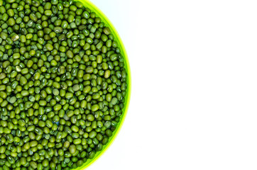 Green beans seed in bowl isolated on white