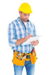 Manual worker writing on clipboard