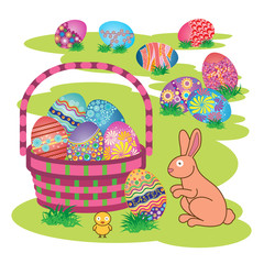 Easter Bunny with Decorated Easter Eggs on Fresh Green Grass