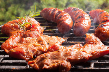 Grilling sausages.