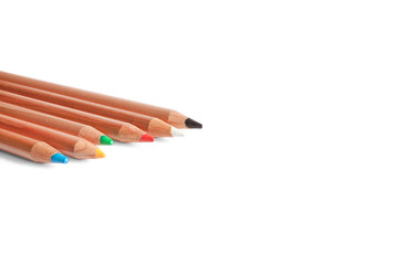 colored pencils in white background