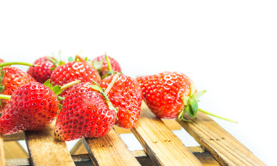 fresh strawberry on wood table isolated on white background.