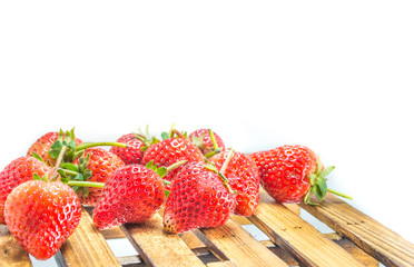 fresh strawberry on wood table isolated on white background.