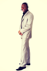 Smiling support phone operator in headset.