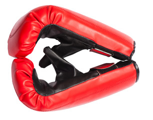 Pair of red leather boxing gloves isolated on white background