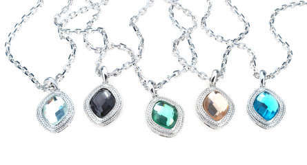 set of chains with chrystal  pendants isolated on white © monstersparrow