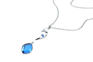 bright blue pendant isolated on white background - obrazy, fototapety, plakaty