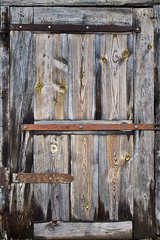 old door made of wooden boards closeup