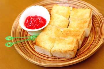 Bread, butter and strawberry jam