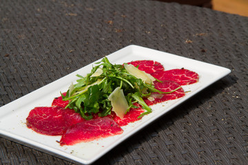 Image of tasty carpaccio on dish