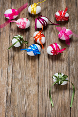 White eggs with colorful ribbons