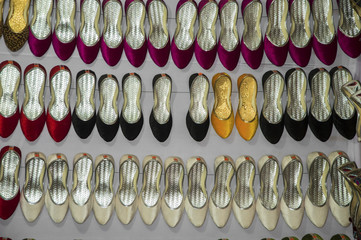 Different shoes in rows