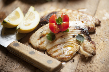 grilled sword fish steak slices