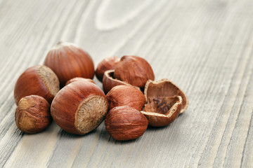 organic hazelnuts on wood table