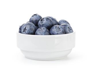 fresh ripe blueberries in white bowl