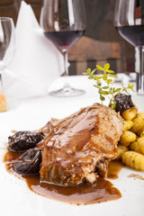 Steak and gnocchi in restaurant
