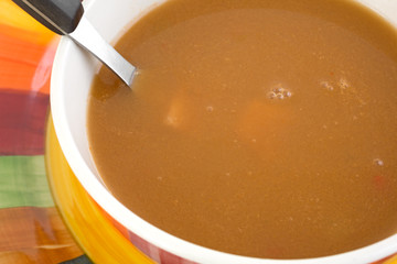 Chicken soup in tomato broth