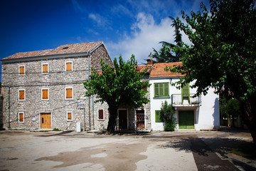 Naklejka premium Traditional houses in small Croatian village