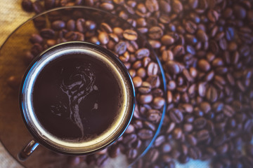 cup of coffee and coffee beans