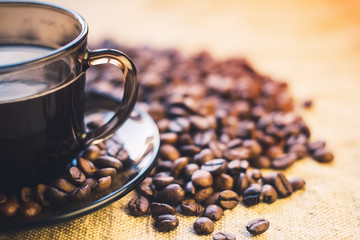 cup of coffee and coffee beans