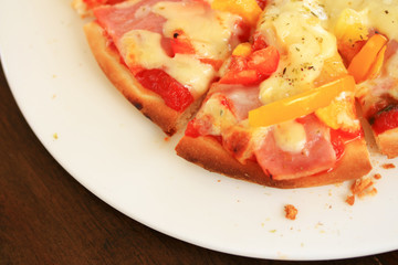 Italian pizza ham cheese and pepper