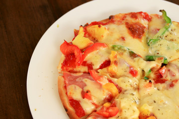 Italian pizza ham cheese and pepper