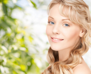 beautiful young woman face with long wavy hair