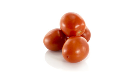 red tomatoes isolated on white
