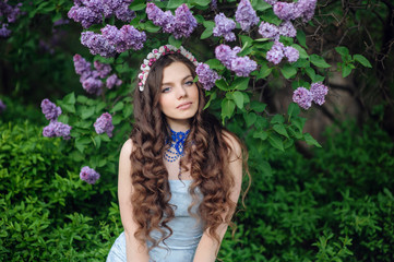 Beautiful woman with flower wreath