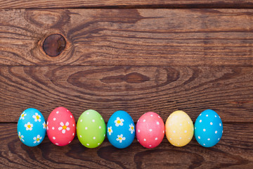 Easter eggs on wooden background