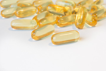 Orange vitamin capsules - medical background