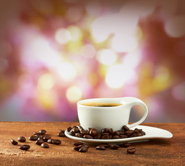 warm cup of coffee on blur background